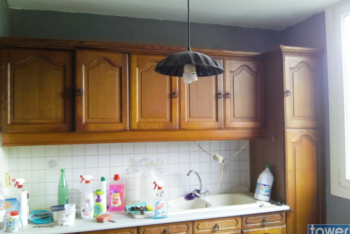 Maison 75 m² à Bethune avec jardin, garage et 3 chambres à proximité du centre-ville 