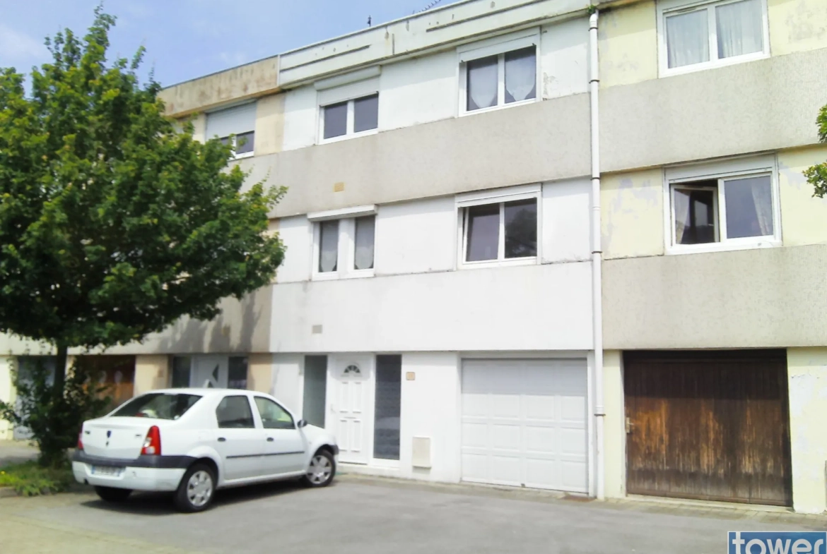 Maison 75 m² à Bethune avec jardin, garage et 3 chambres à proximité du centre-ville 