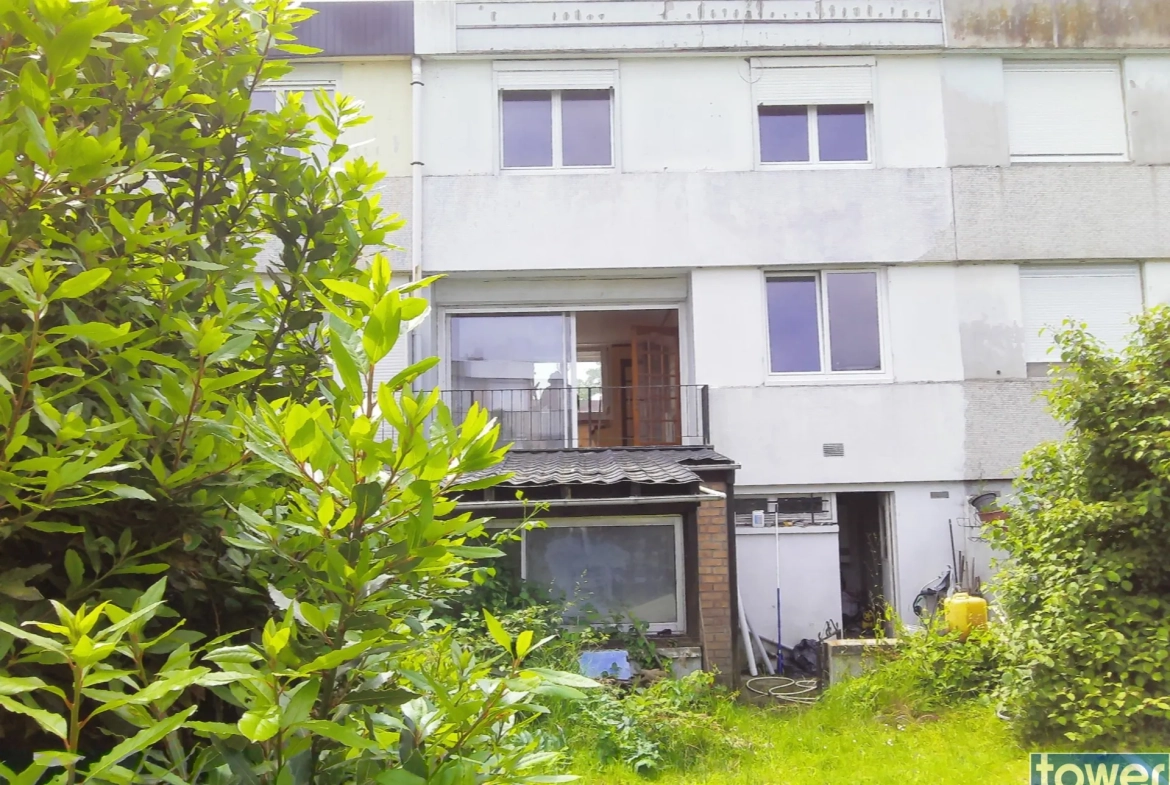 Maison 75 m² à Bethune avec jardin, garage et 3 chambres à proximité du centre-ville 