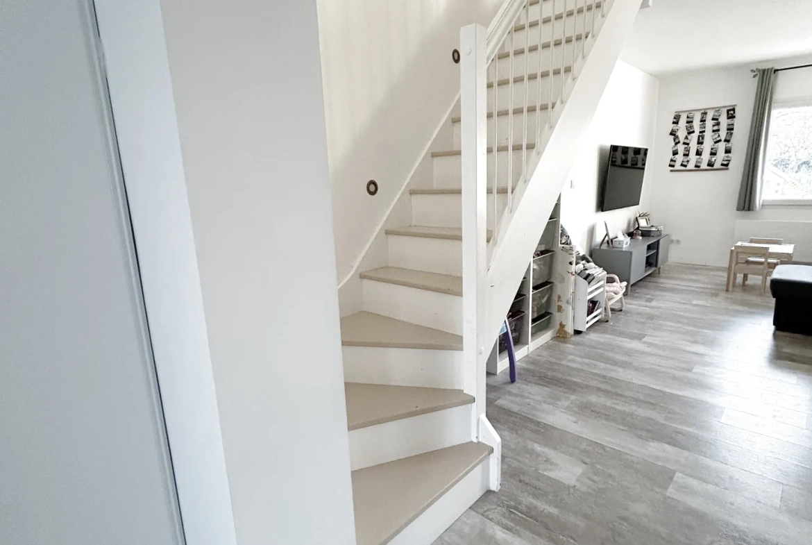 Maison familiale à Saint-Soullle avec jardin et garage - Investissement ou résidence 