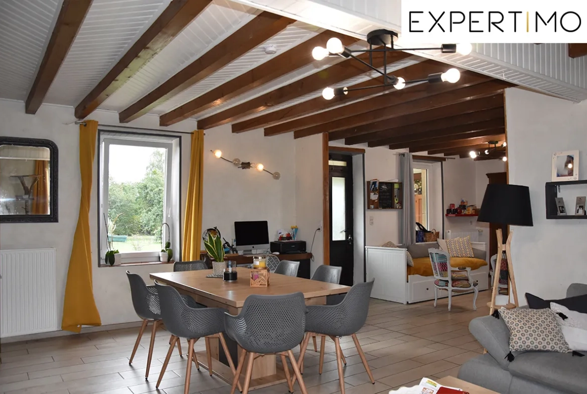 Maison rénovée de 190m² avec grand terrain à Pionsat, idéale pour résidence familiale 