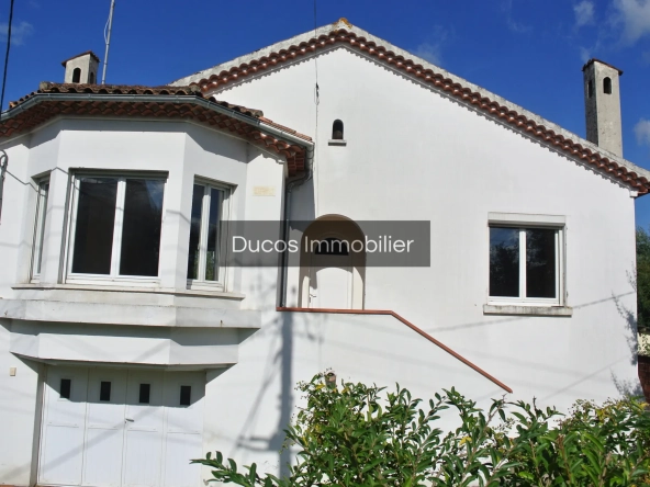 Maison à Marmande avec jardin clos et travaux récents, proche du centre-ville 