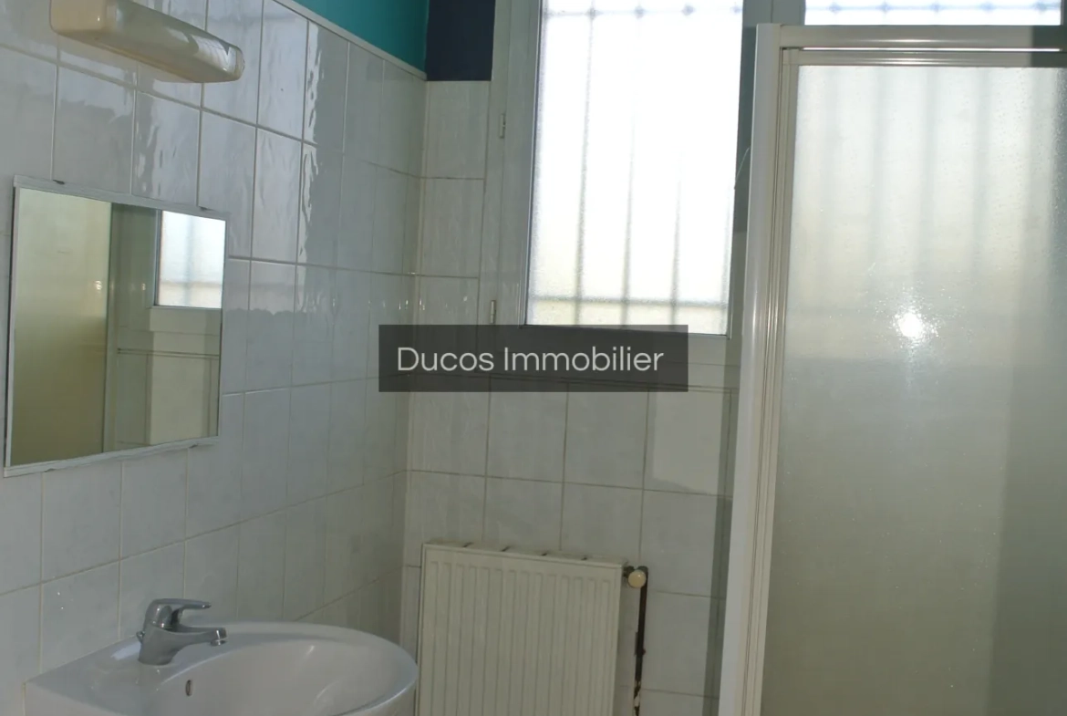 Maison à Marmande avec jardin clos et travaux récents, proche du centre-ville 