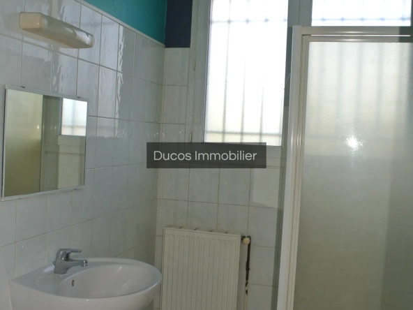 Maison à Marmande avec jardin clos et travaux récents, proche du centre-ville 