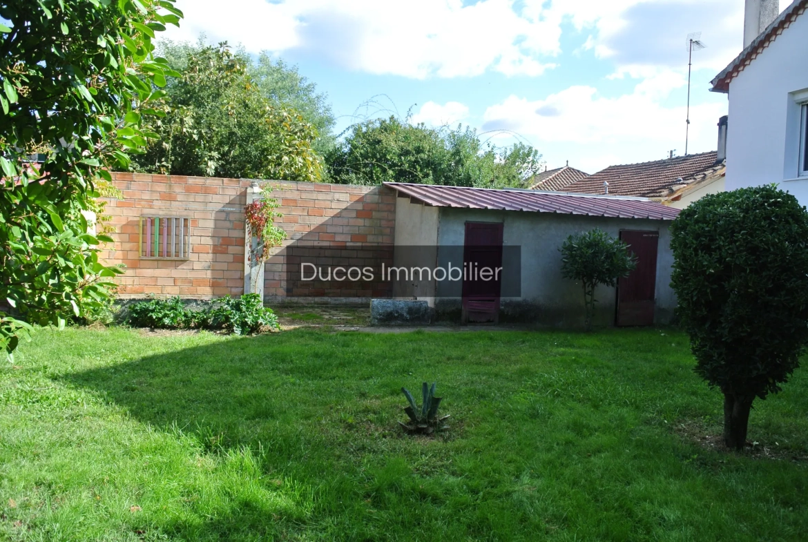 Maison à Marmande avec jardin clos et travaux récents, proche du centre-ville 