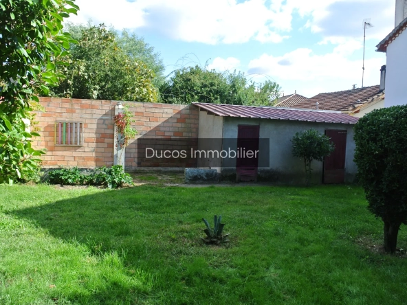Maison à Marmande avec jardin clos et travaux récents, proche du centre-ville 