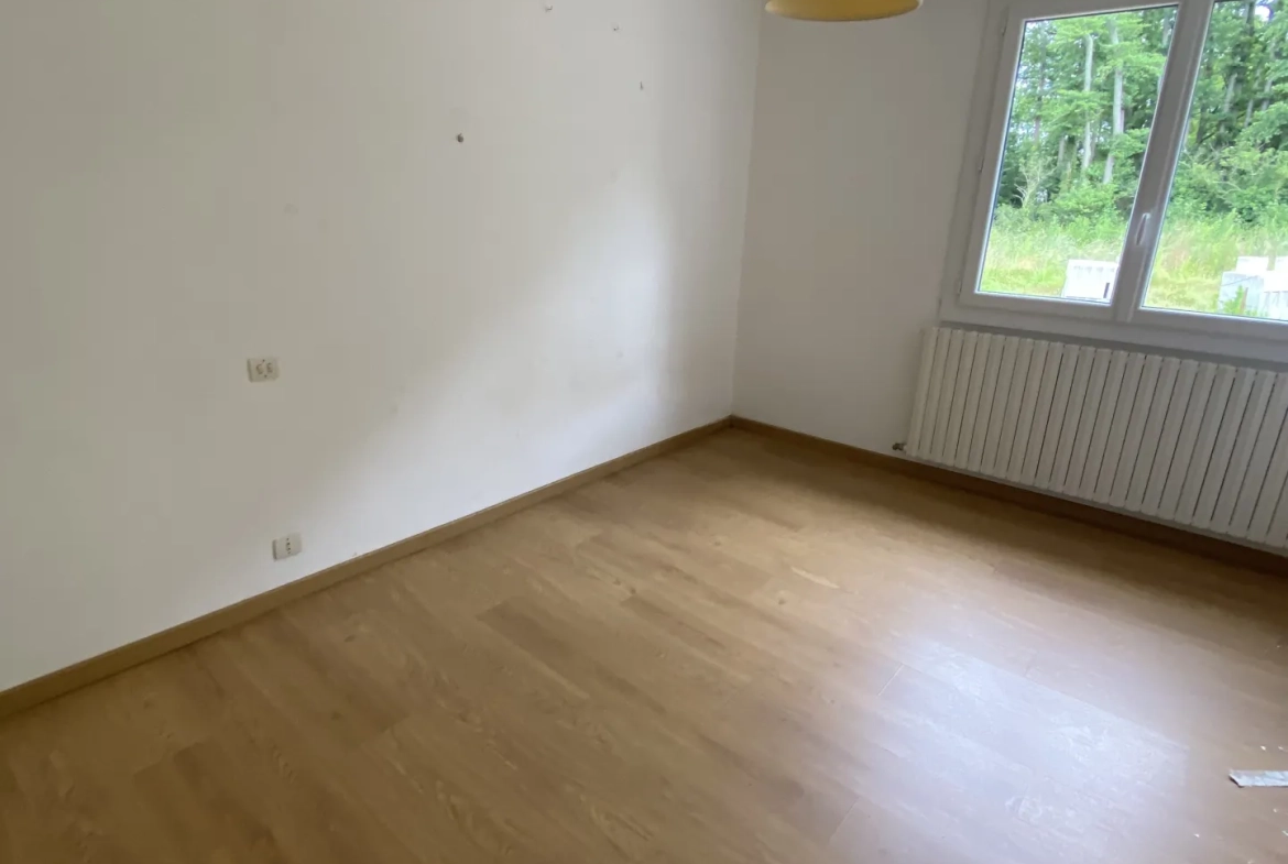 Maison 3 chambres avec garage à Challans, jardin et chauffage au fioul 