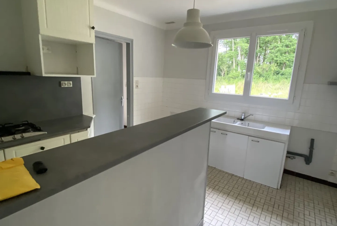 Maison 3 chambres avec garage à Challans, jardin et chauffage au fioul 