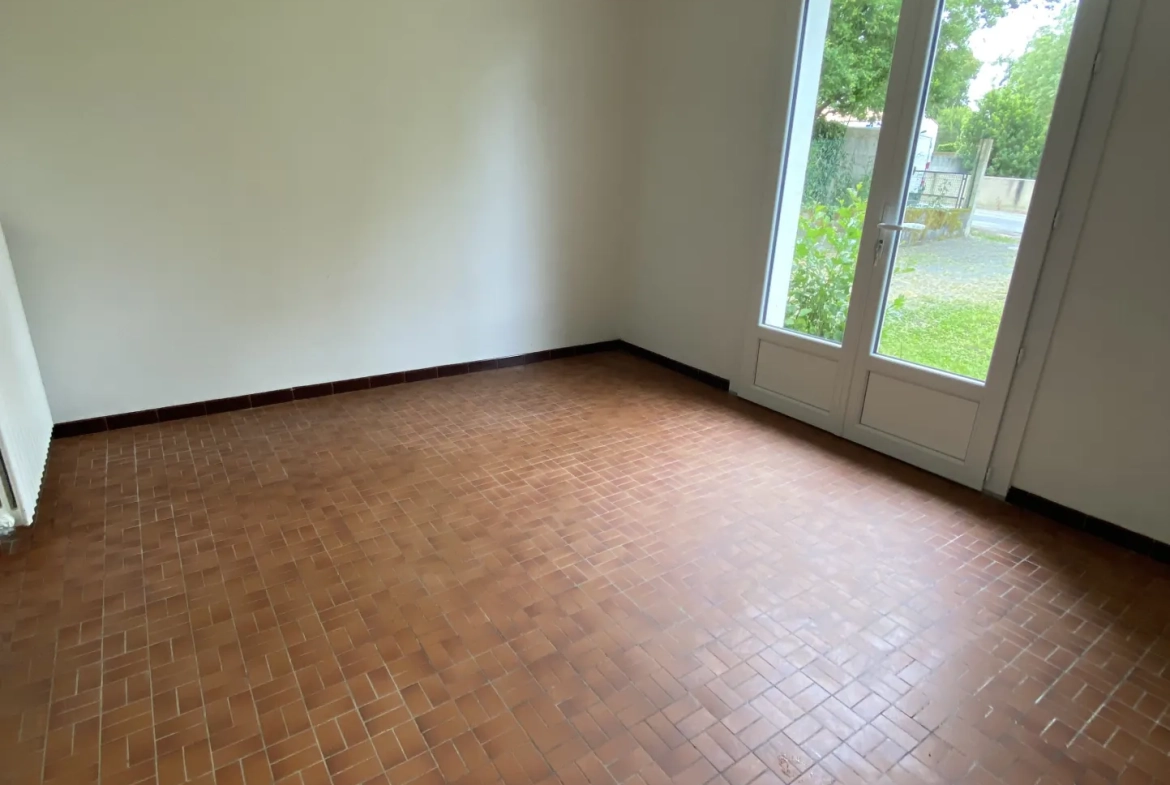 Maison 3 chambres avec garage à Challans, jardin et chauffage au fioul 