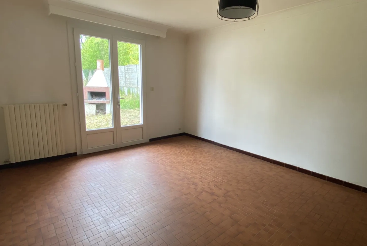 Maison 3 chambres avec garage à Challans, jardin et chauffage au fioul 