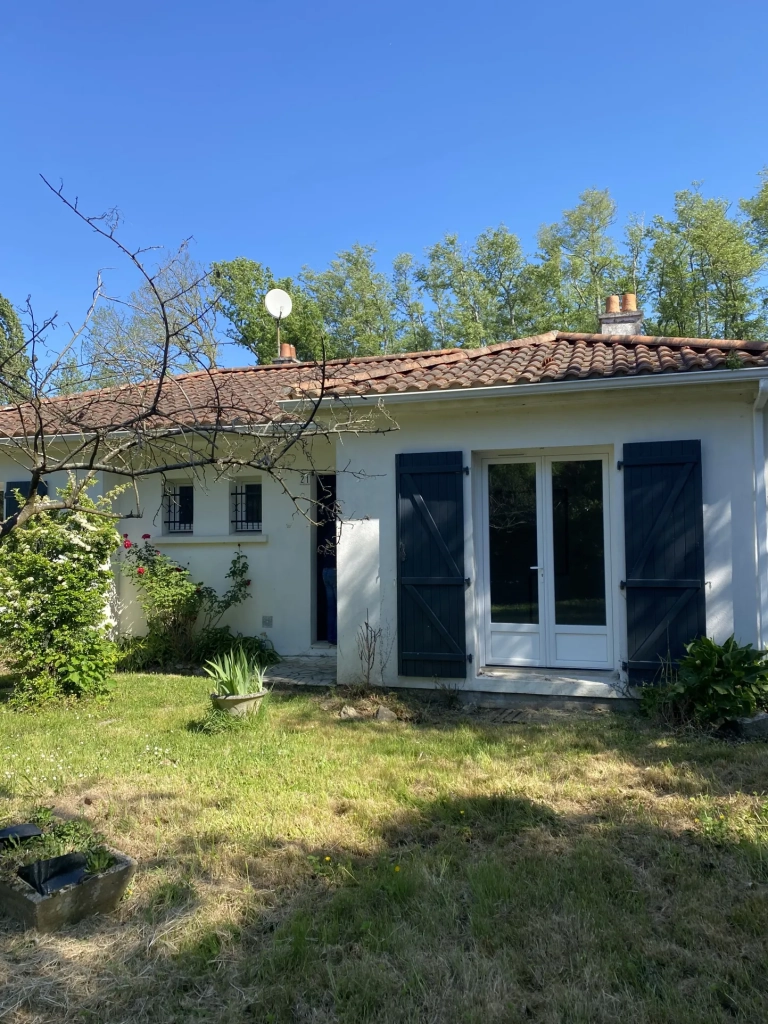 Maison 3 chambres avec garage à Challans, jardin et chauffage au fioul