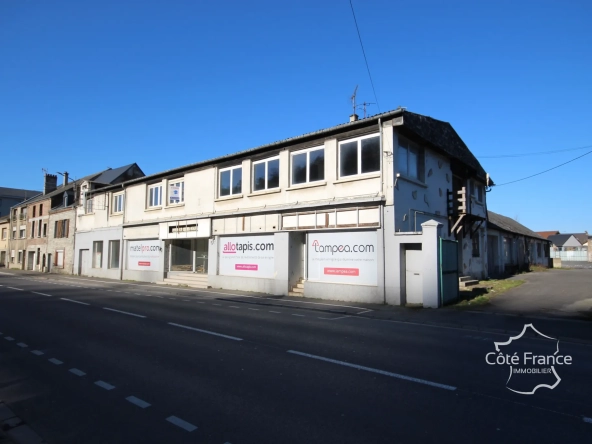 Vente bâtiment professionnel à Givet avec grande vitrine et parking stratégique