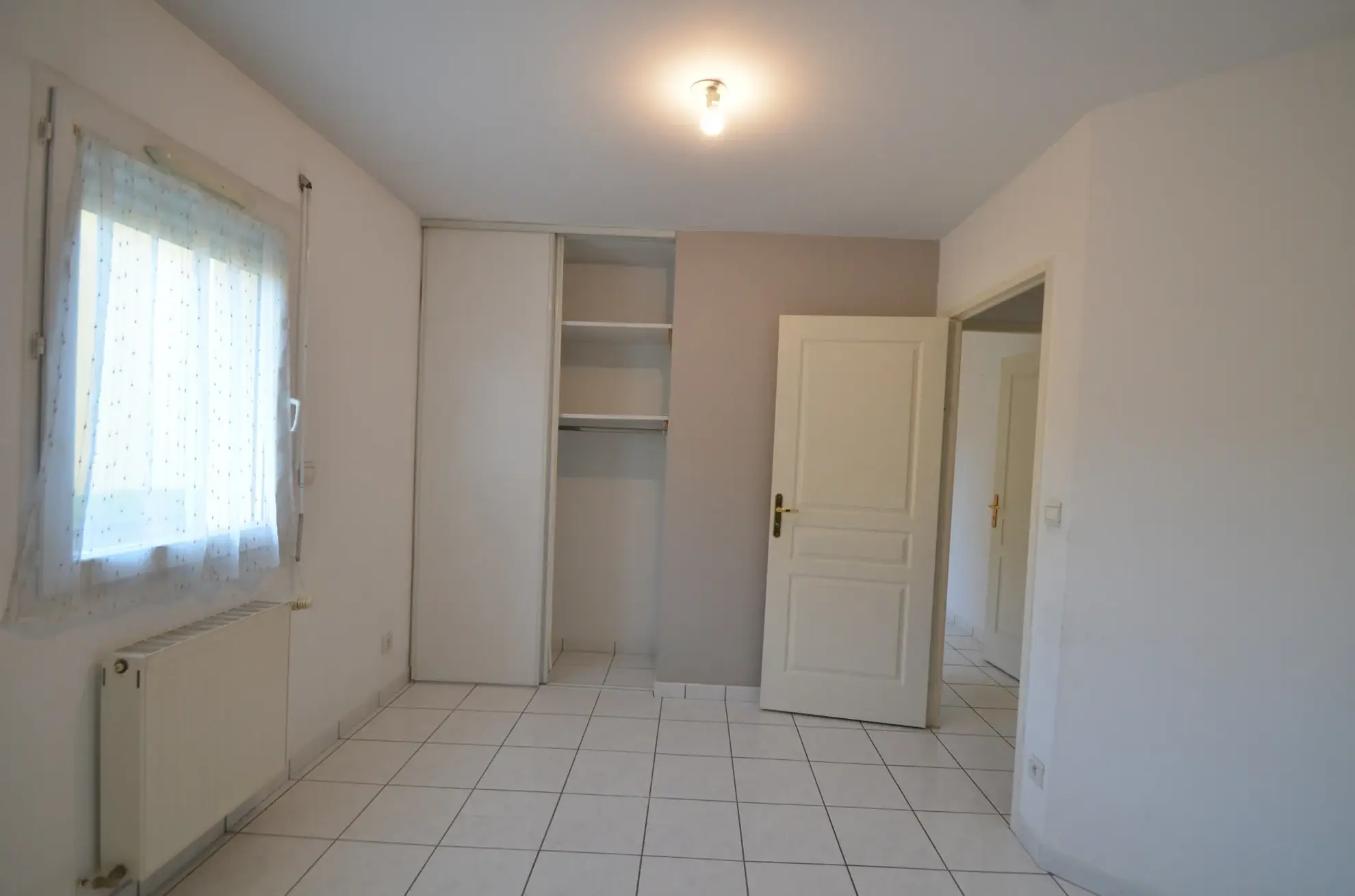 Appartement T4 avec terrasse et garage au centre-ville de Romans-sur-Isère 