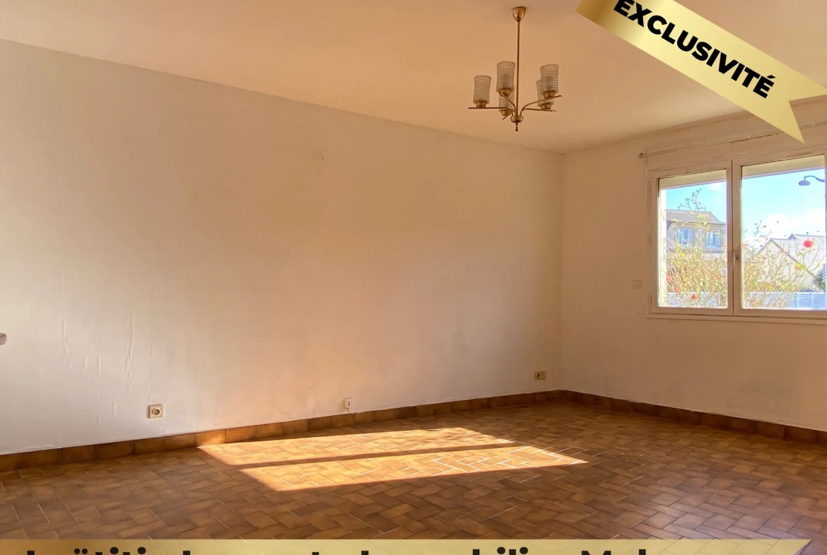 Maison familiale en pierre à Melesse avec grand volume et potentiel de rénovation 
