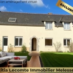 Maison familiale en pierre à Melesse avec grand volume et potentiel de rénovation