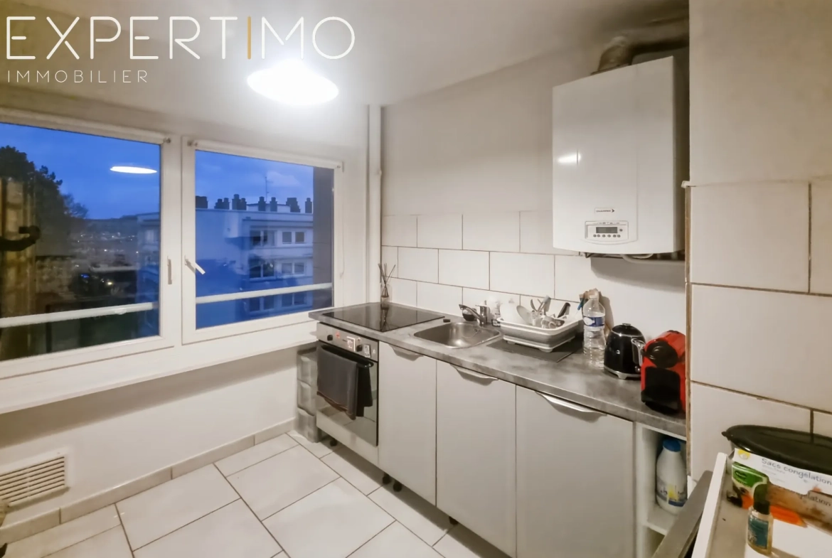 Appartement à vendre à Eu, 2 chambres, vue sur la ville, parking et cave 
