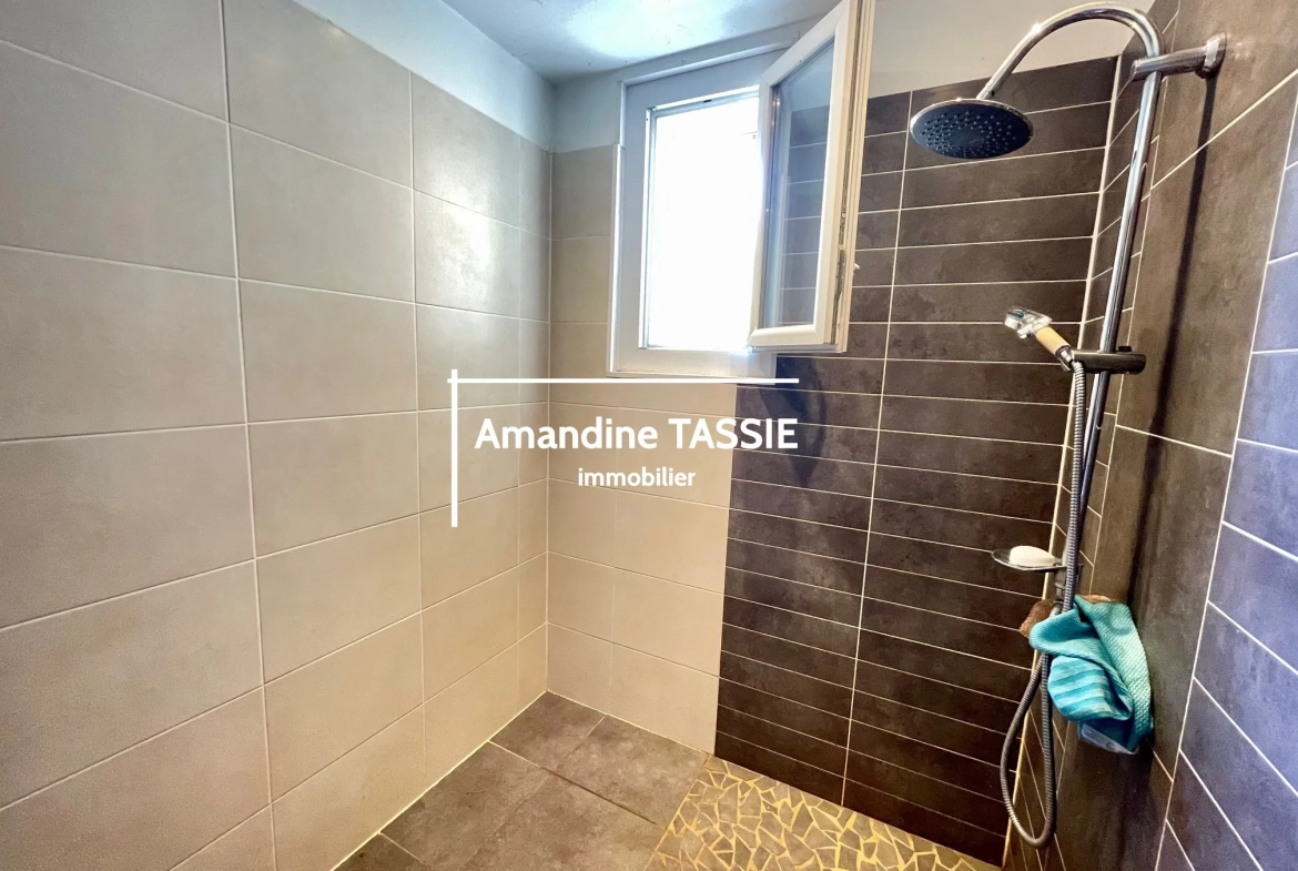 Maison individuelle lumineuse à Graulhet avec terrain constructible de 3450 m² 