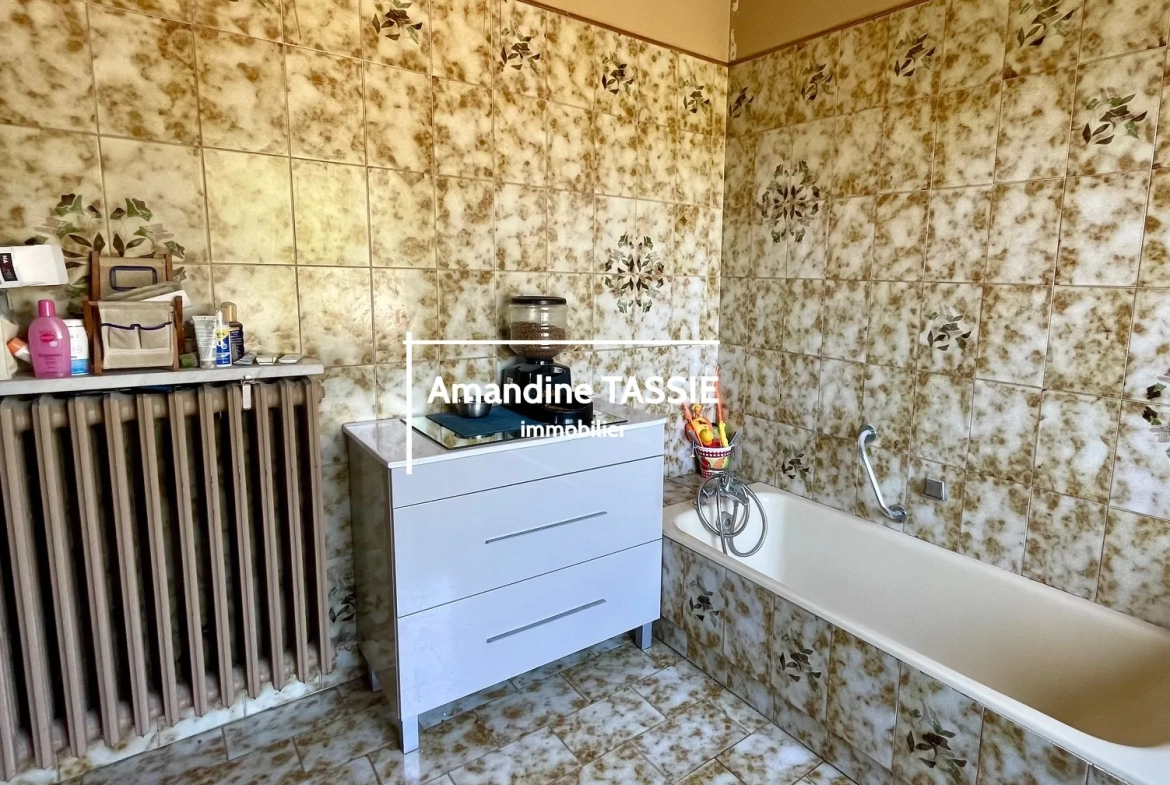 Maison individuelle lumineuse à Graulhet avec terrain constructible de 3450 m² 