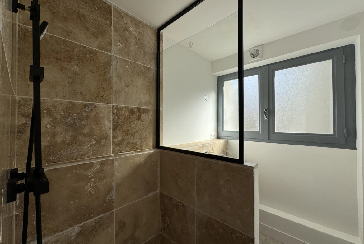 Appartement T3 rénové à Montpellier centre-ville avec terrasse, balcon et garage près de la gare Saint Roch 