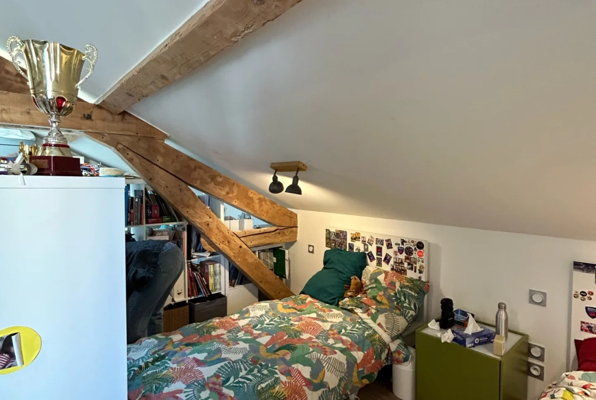 Maison individuelle à vendre à Romans-sur-Isère offrant confort et modernité 