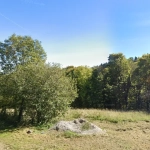 Terrain à bâtir de 828 m² à Orcines, vue dégagée et exposition sud