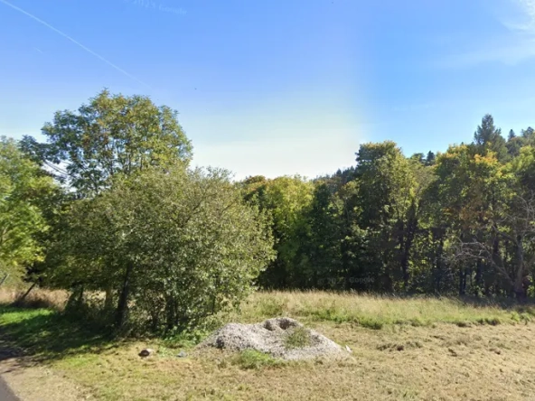Terrain à bâtir de 828 m² à Orcines, vue dégagée et exposition sud