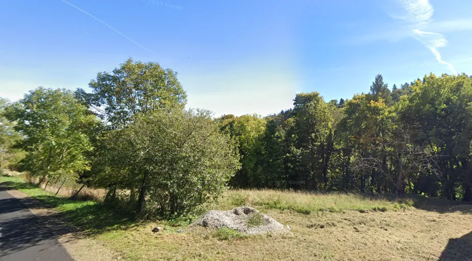Terrain à bâtir de 828 m² à Orcines, vue dégagée et exposition sud 