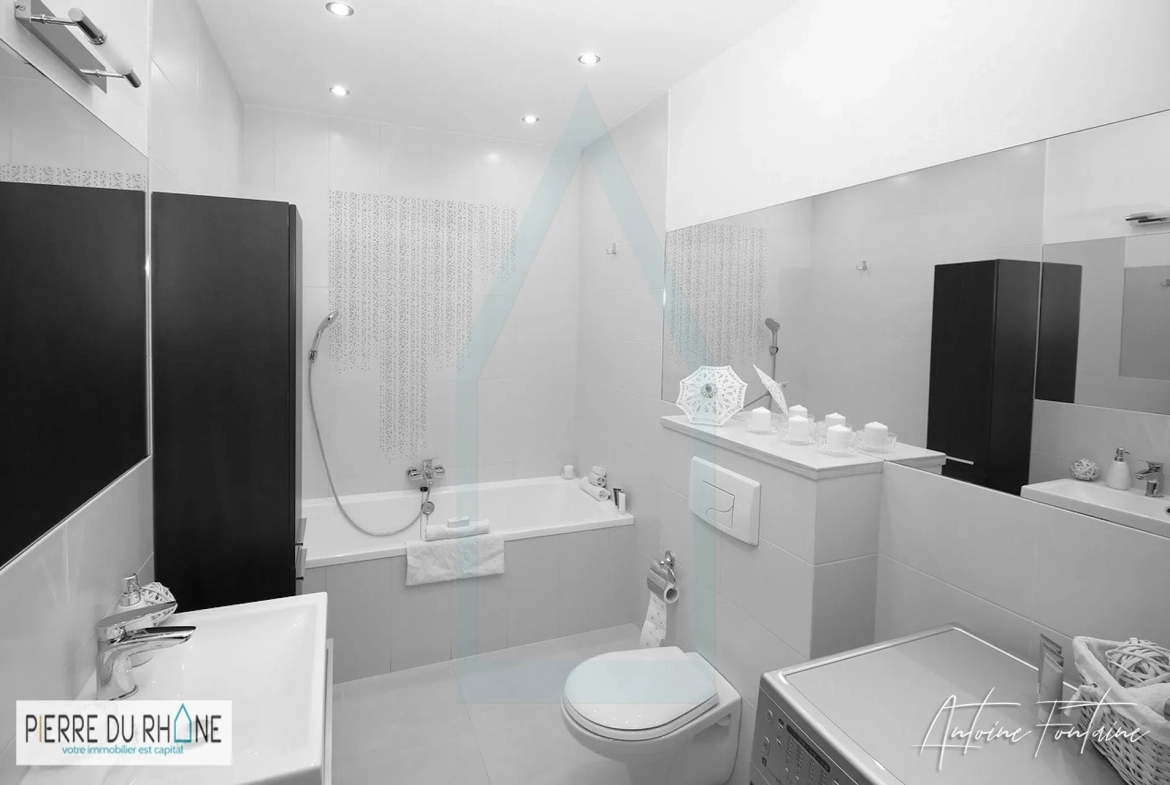 Appartement T3 à Villeurbanne avec balcon et garage, proche écoles et transports 