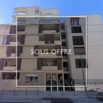 Appartement T3 à Villeurbanne avec balcon et garage, proche écoles et transports