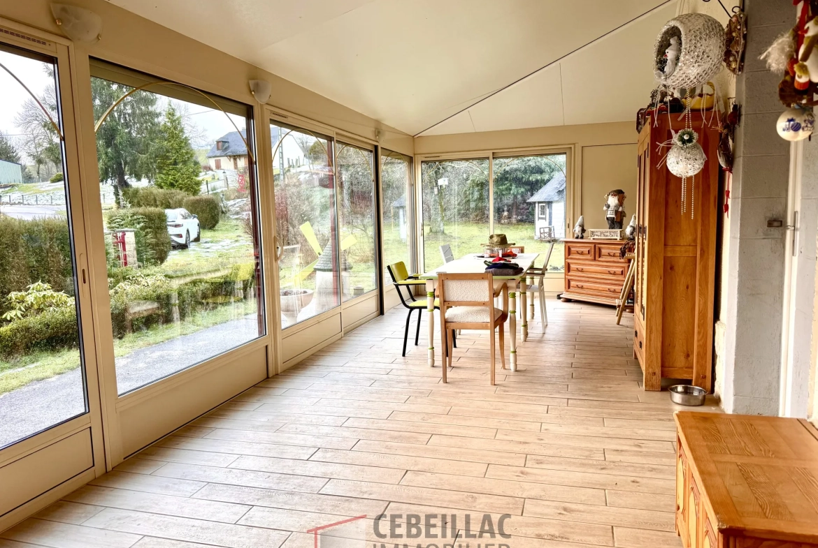 Maison à vendre avec véranda, garage et espace nature près de Murat 