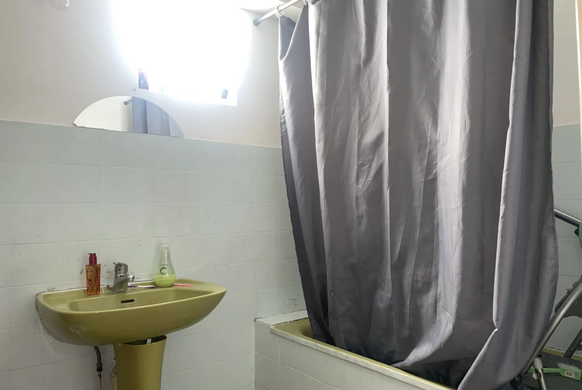 Appartement T3 de 64,04 m² avec cave et balcon à Marseille 13003 