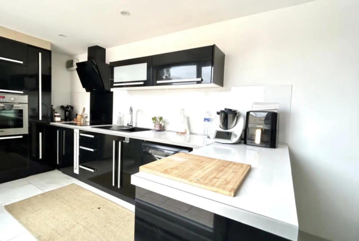 Maison de ville 106m² avec hangar et terrasse ensoleillée à Montigny-en-Gohelle 