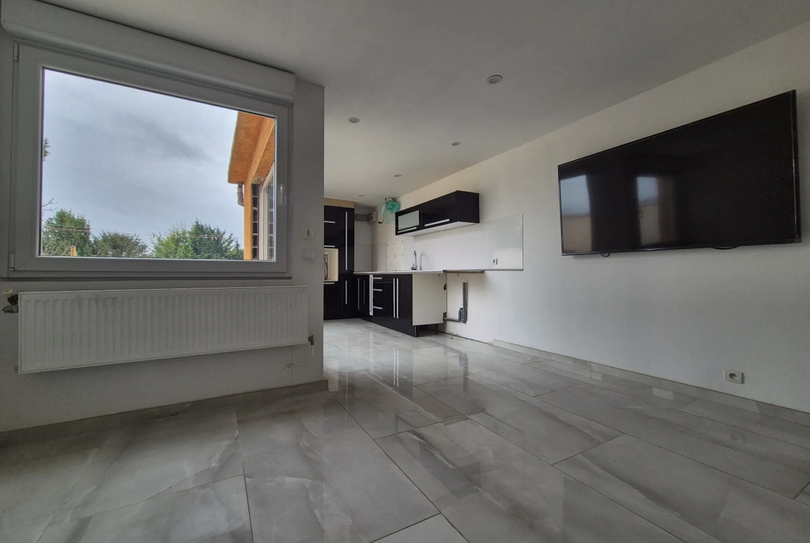 Maison de ville 106m² avec hangar et terrasse ensoleillée à Montigny-en-Gohelle 