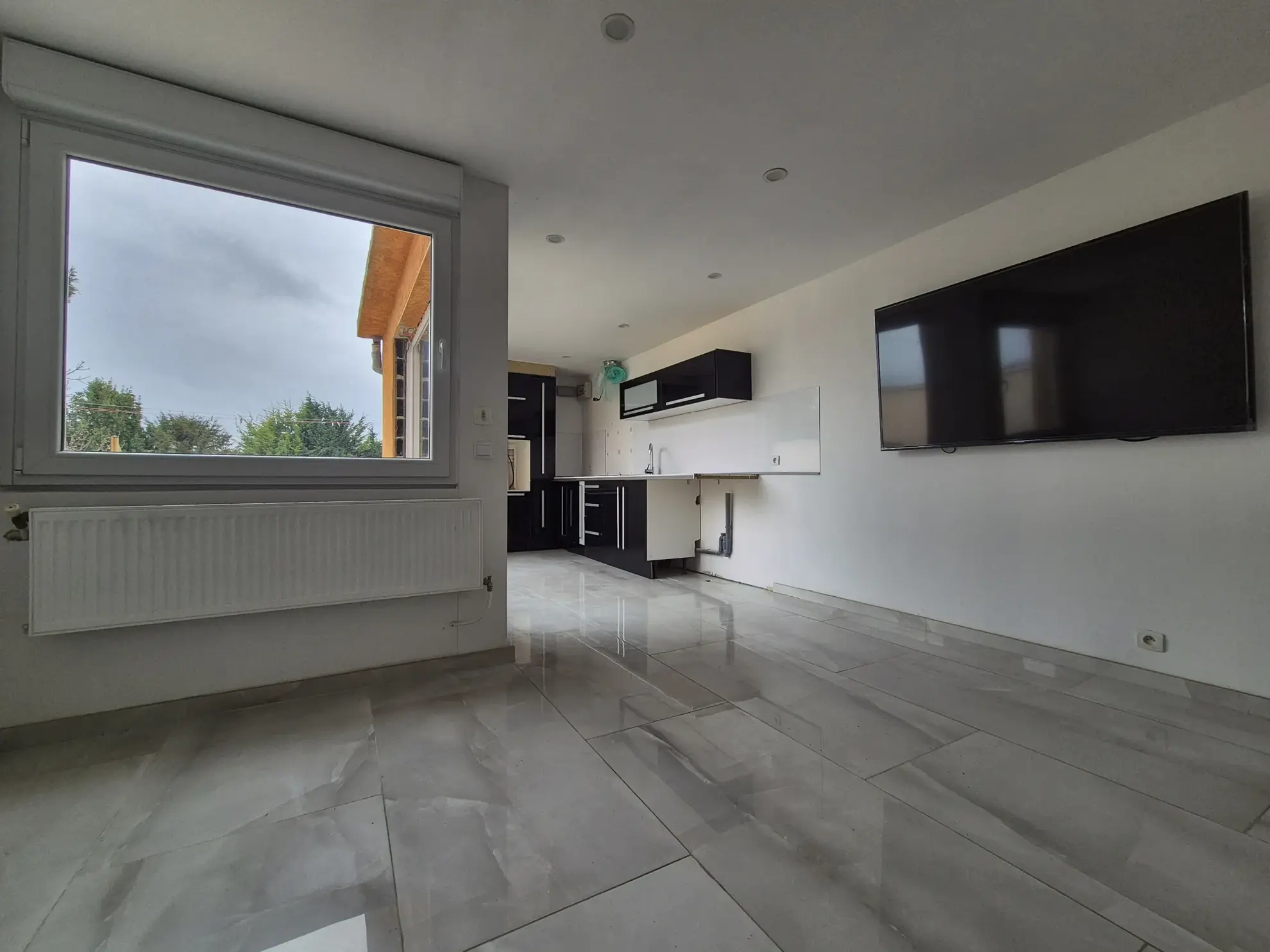 Maison de ville 106m² avec hangar et terrasse ensoleillée à Montigny-en-Gohelle 
