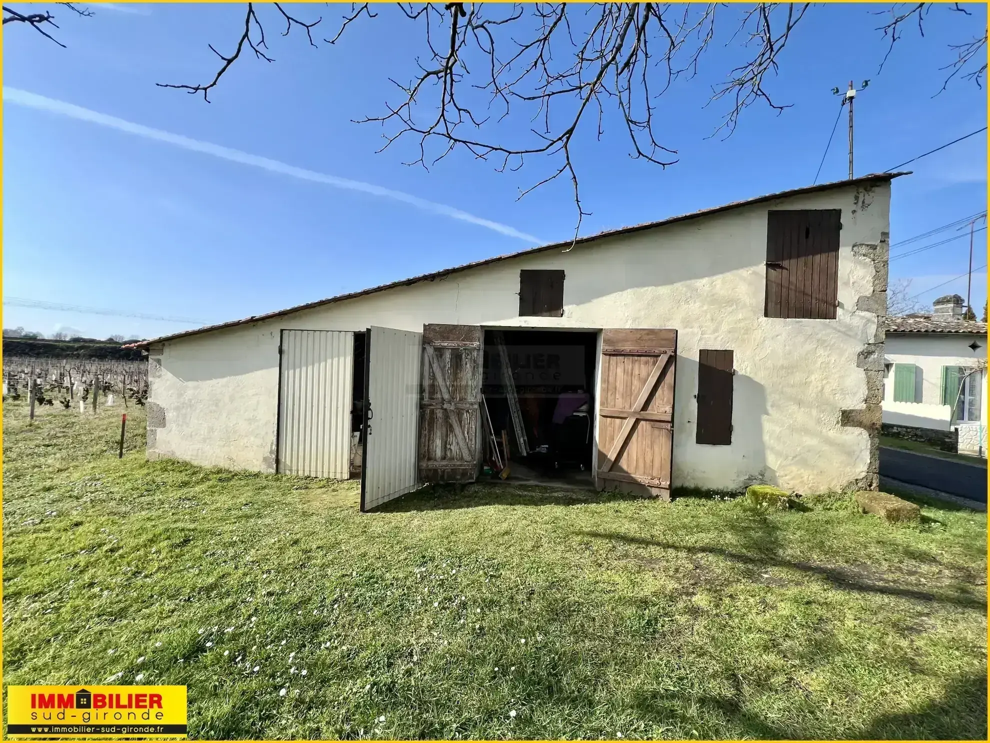 Maison en pierre à Barsac avec jardin et garages, location en place 