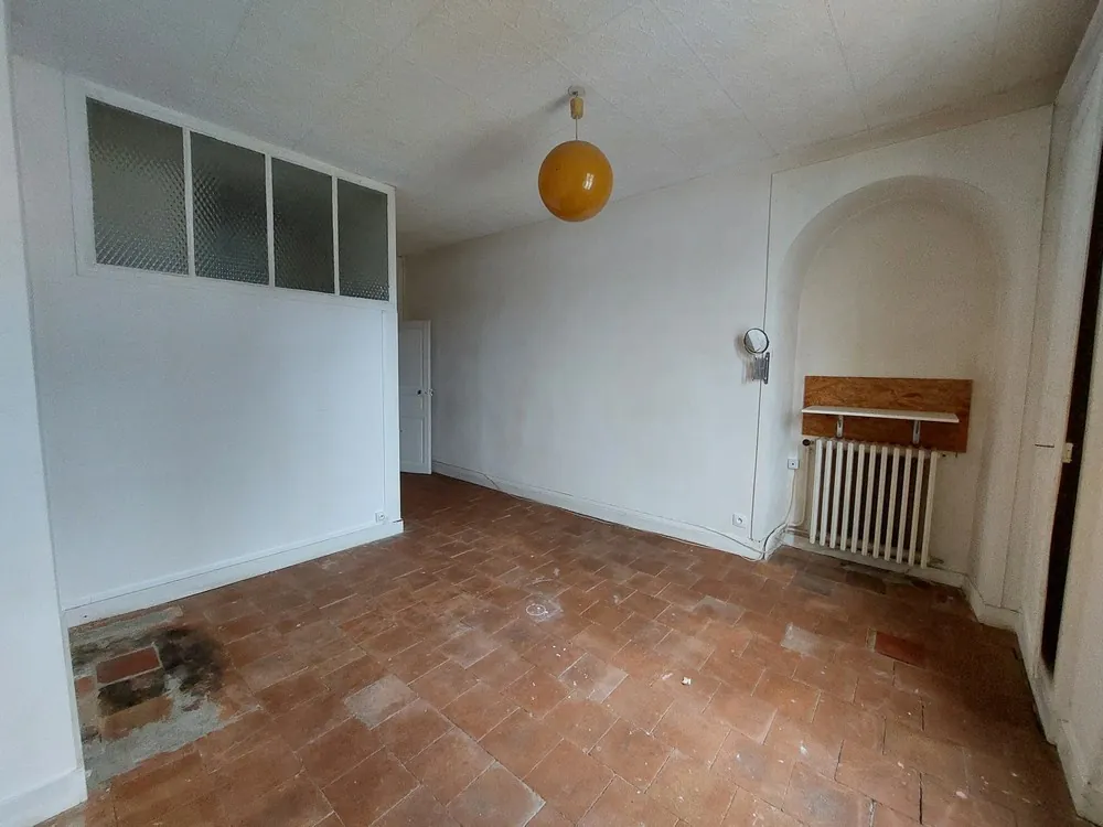 Maison à rénover de 90 m² au cœur de Bouloire, proche commerces 