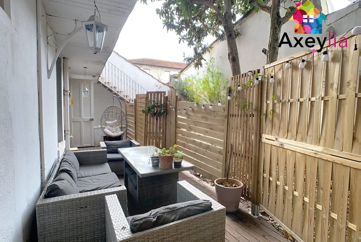 Appartement T4 rénové en rez-de-jardin à Roanne près de la gare 