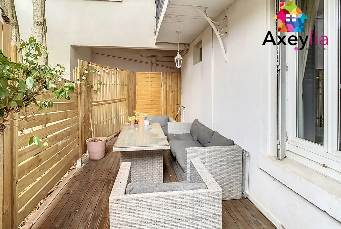 Appartement T4 rénové en rez-de-jardin à Roanne près de la gare 