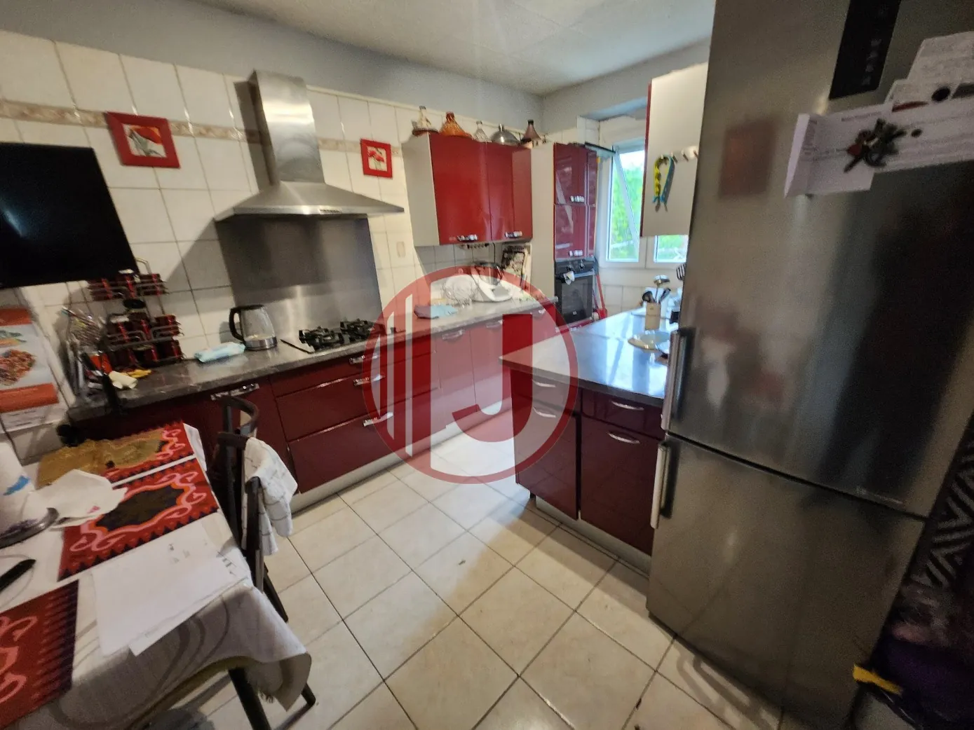 Investissement immobilier à Mulhouse : immeuble de 6 logements avec annexes et potentiel de développement 