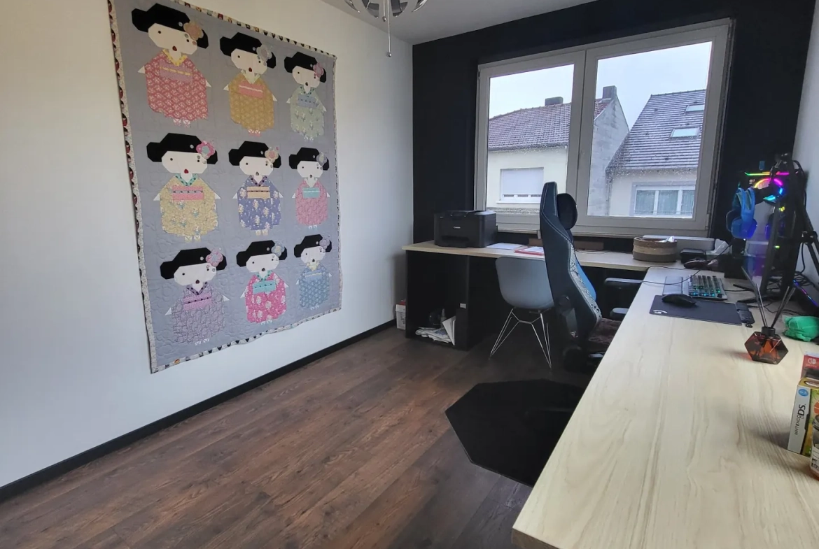 Appartement F3 rénové à Creutzwald avec garage et cave 