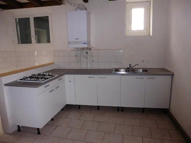 Maison de ville 3 pièces avec jardin et garage à Villeneuve-sur-Lot 