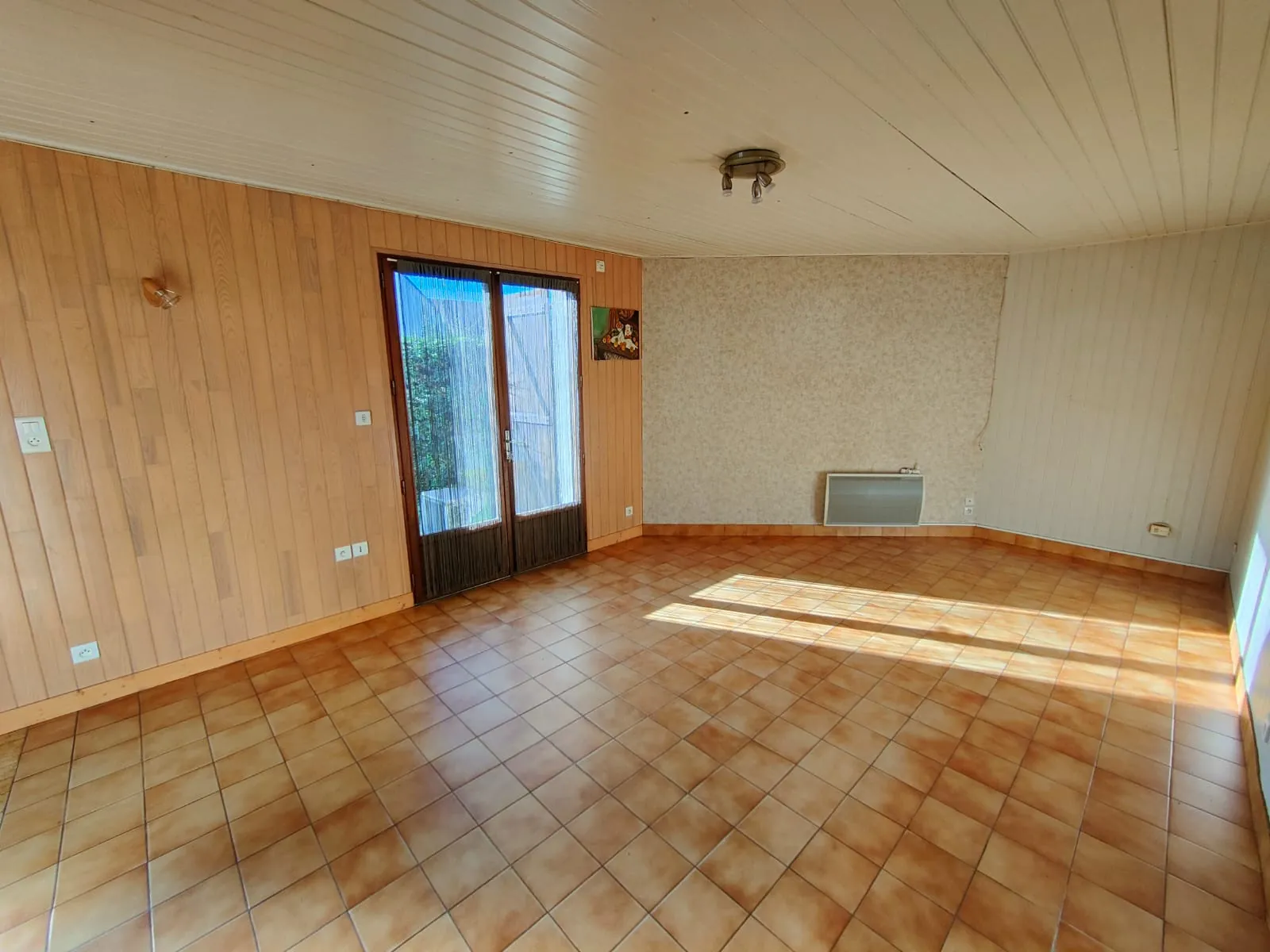 Maison à vendre à La Chapelle Launay avec grand terrain et potentiel d'aménagement 