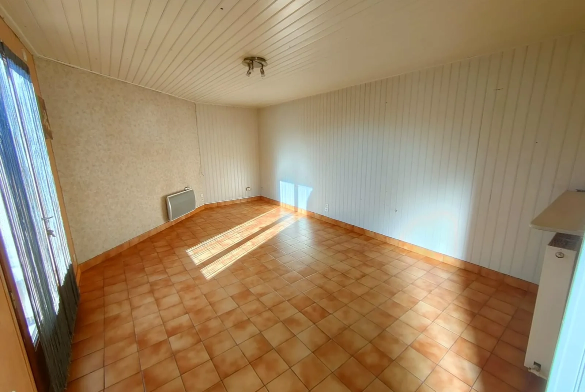 Maison à vendre à La Chapelle Launay avec grand terrain et potentiel d'aménagement 