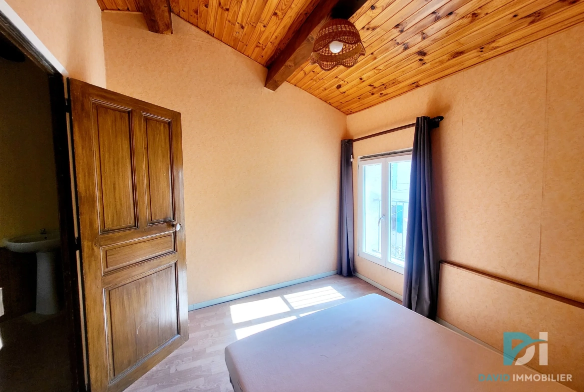 Maison de ville à Magalas avec cave et 2 chambres, parfait investissement immobilier 