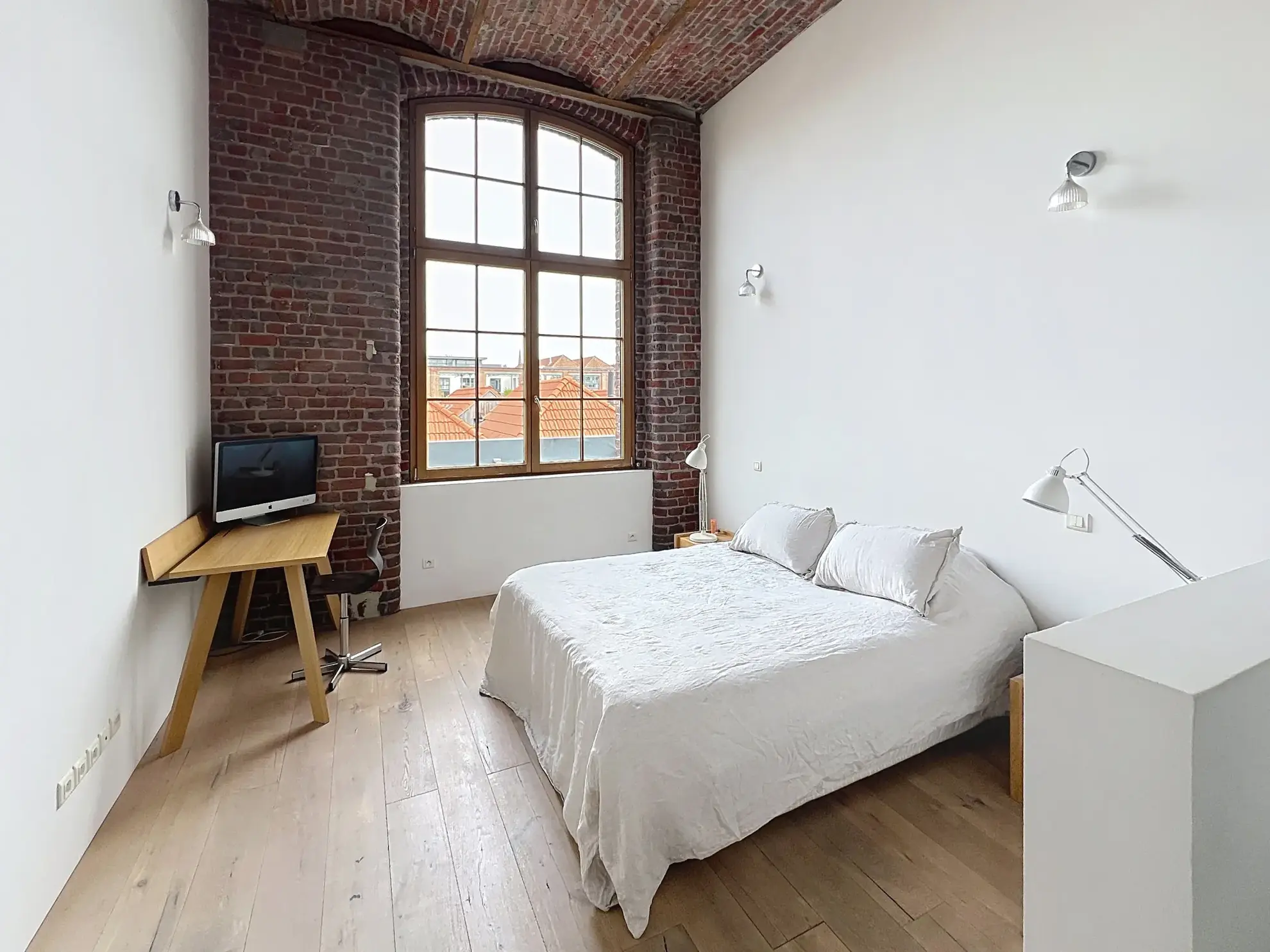 A vendre Loft spacieux de 150 m² à Tourcoing avec parking, cave et style industriel 
