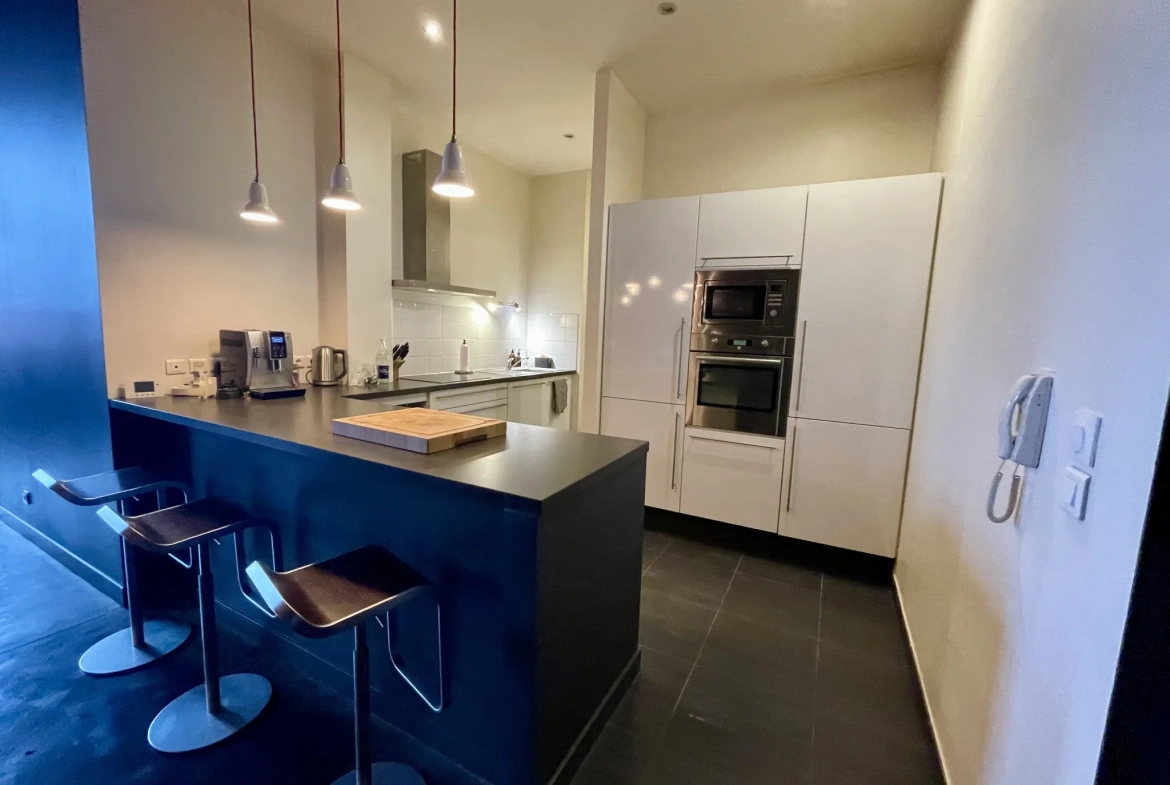 A vendre Loft spacieux de 150 m² à Tourcoing avec parking, cave et style industriel 