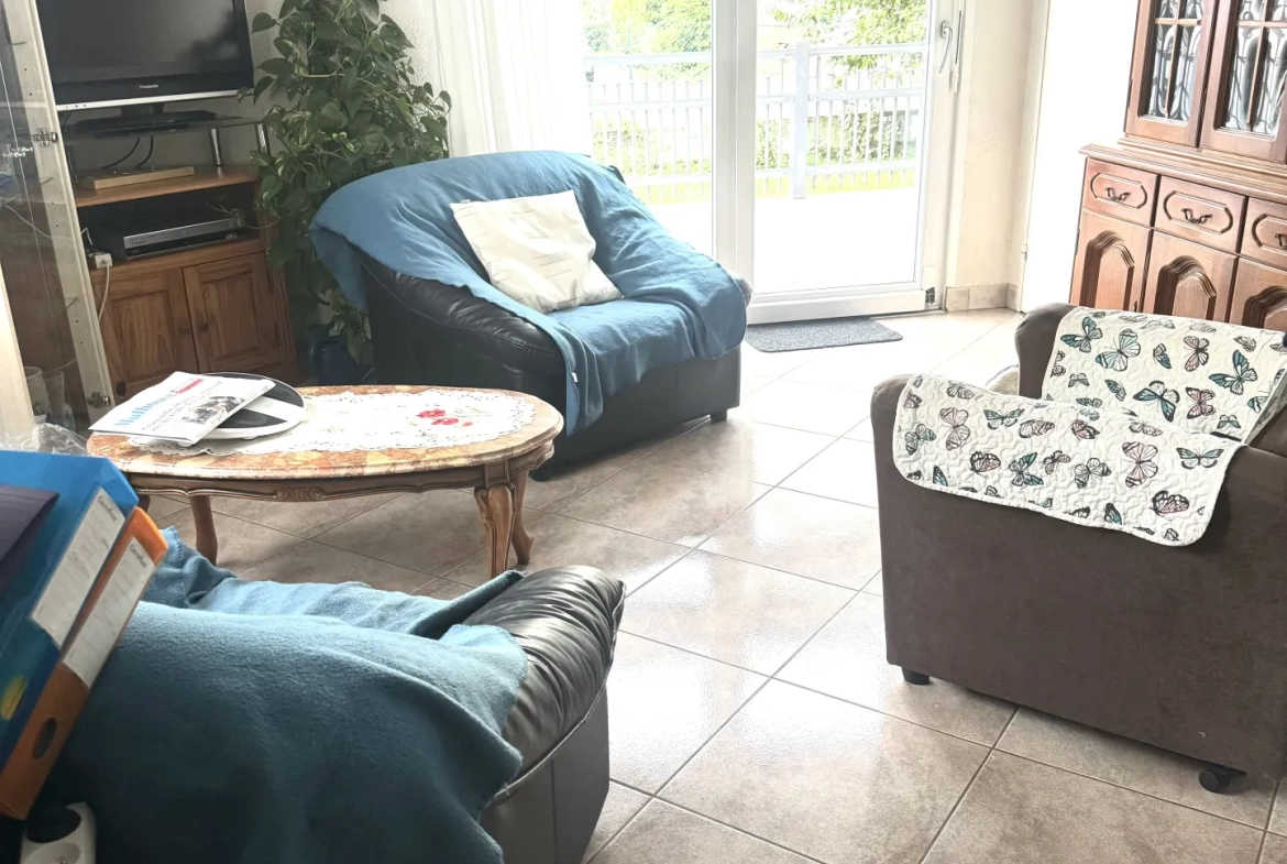 Maison individuelle de 95 m² à Illzach avec jardin et garage 