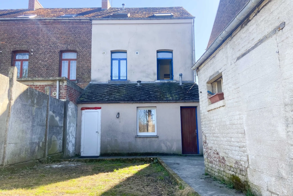Immeuble de rapport à Jeumont, proche de la gare et des commodités 