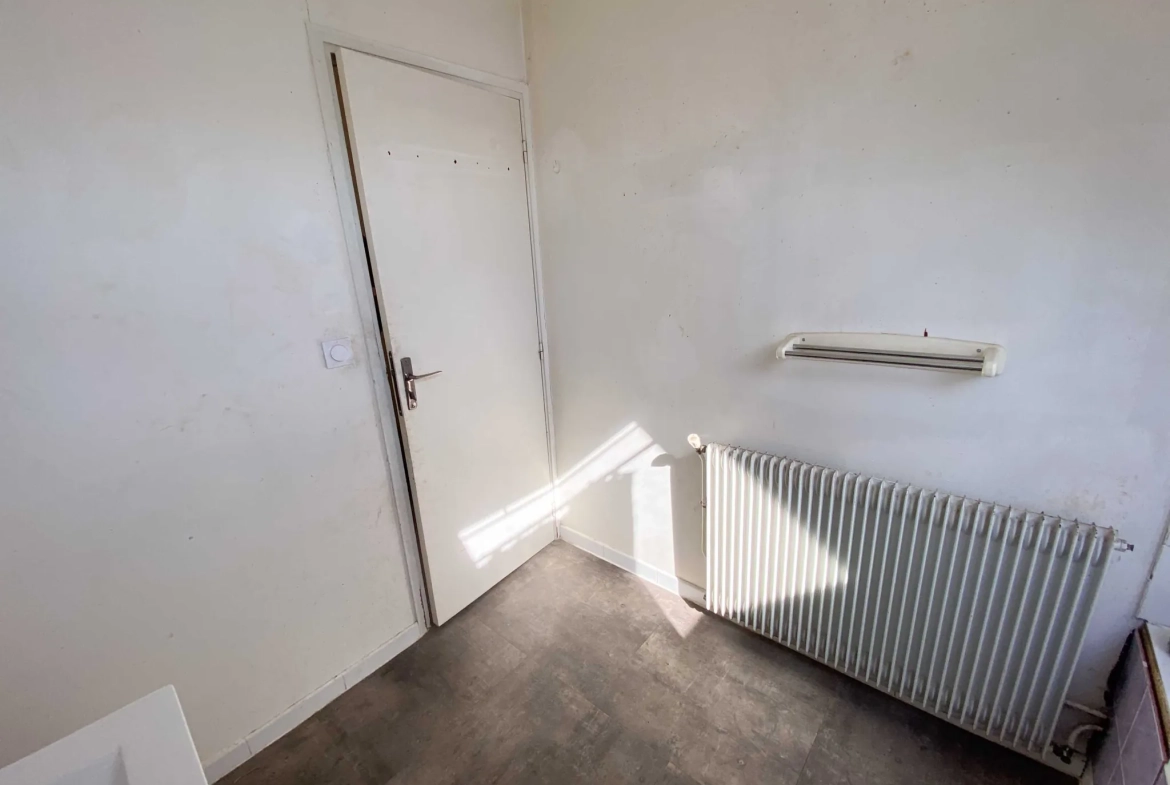 Immeuble de rapport à Jeumont, proche de la gare et des commodités 