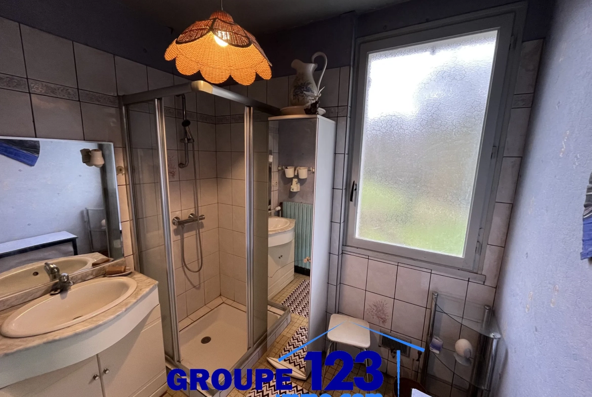À vendre à Auxerre : pavillon avec sous-sol et terrain spacieux de 1009 m² 